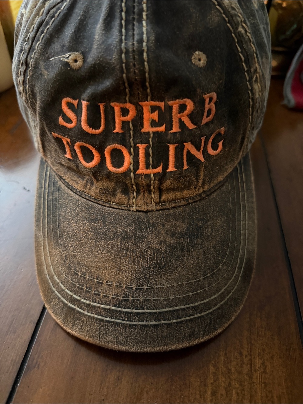Distressed Black Baseball Cap with Orange Embroidery